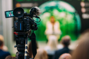 tv-camera-at-a-green-energy-public-media-event-2023-11-27-04-49-25-utc